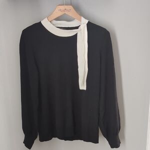 Black Sweater with Cream Neck Tie Accent
